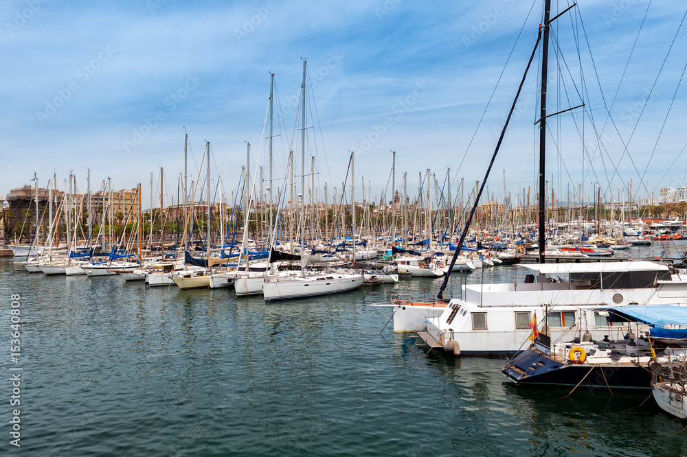 Moored yachts at sea port of Barcelona town, Catalonia, Spain