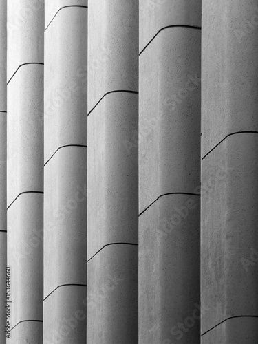 modern concrete brutalist wall with vertical moulding