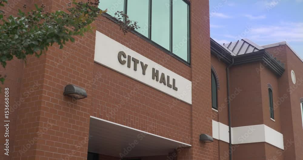 A daytime closeup establishing shot of a generic city hall building. A daytime closeup establishing shot of a generic city hall building.