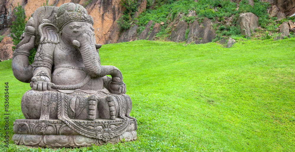 Ganesha statue in a beautiful mountain garden Ganesha statue in a beautiful mountain garden