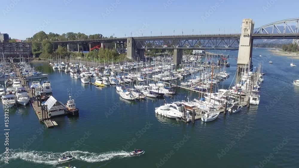 Aerial of Burrard Bridge with Boats and Jet Skis from Granville Island Dock Aerial of Burrard Bridge with Boats and Jet Skis from Granville Island Dock