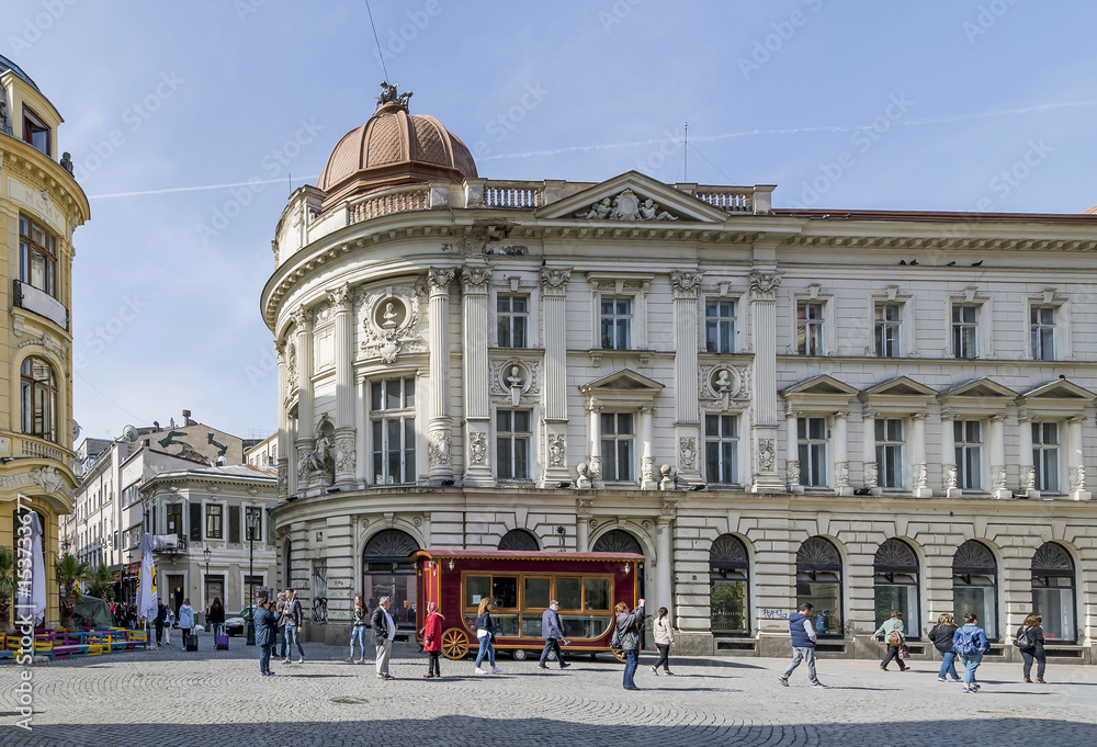 The intersection of roads between Strada Smardan and Strada Lipscani in the historic center of Bucharest, Romania, on a sunny day