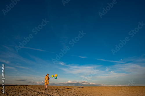 Fototapeta Naklejka Na Ścianę i Meble -  Woman and toy balloons