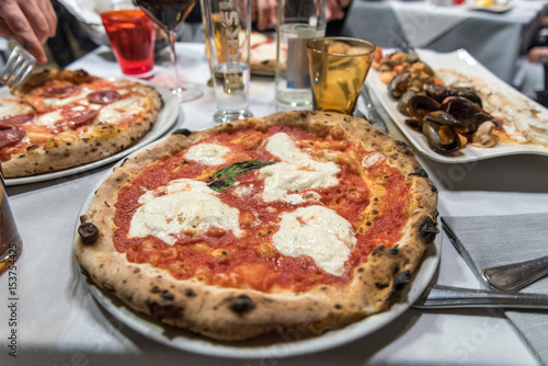 A typical italian pizza served in a restaurant