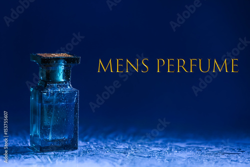 Men's perfume. Bottle of cologne and text on color background