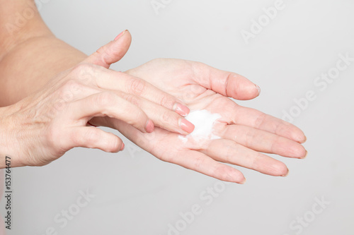 Moisture phase. Cropped shot of female hands applying cream