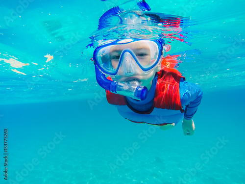 Underwater Young Boy Fun in the sea with snorkel. Summer Vacation Fun.