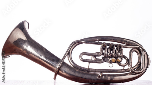 Alto saxhorn close up isolated on white photo