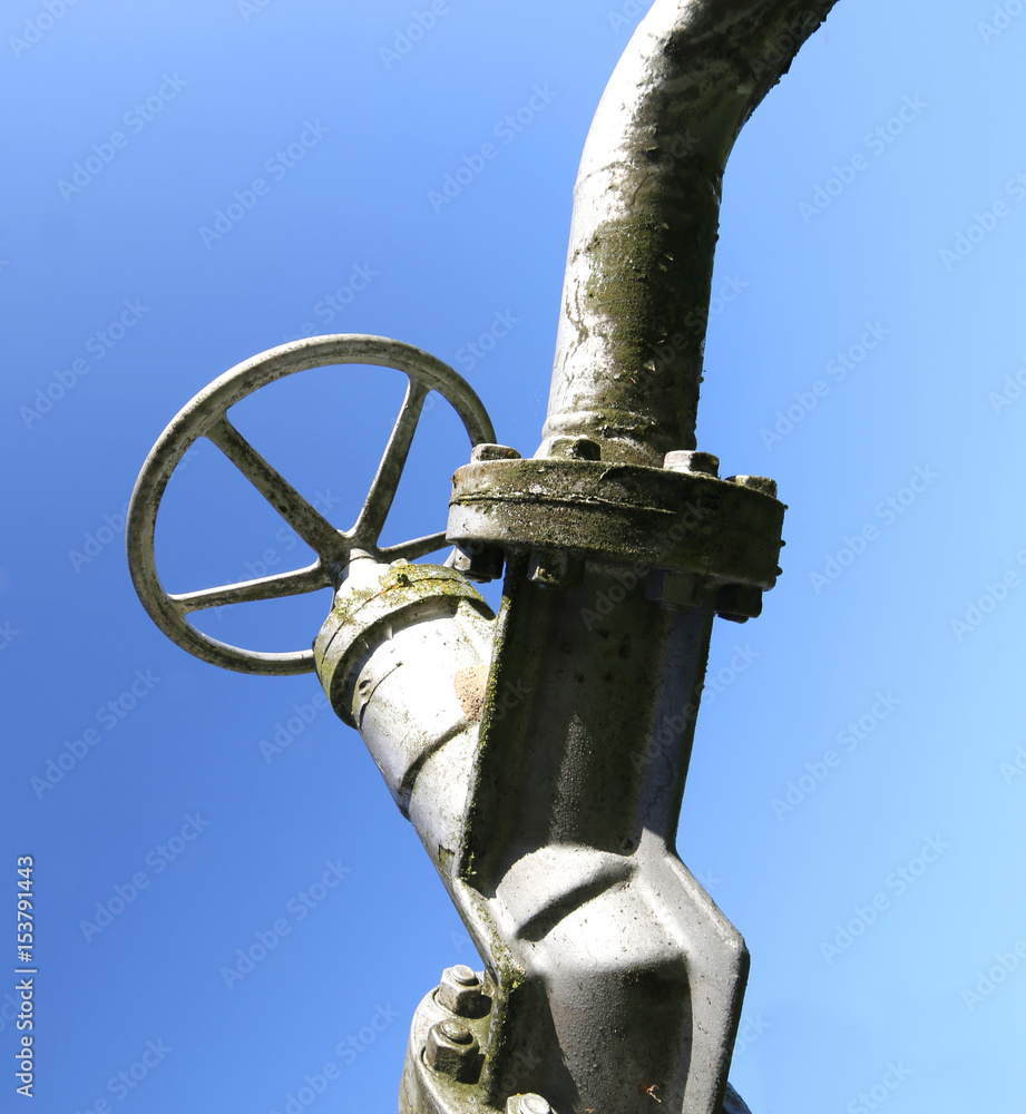 big tap with the shutoff valve of the pipe in an industrial plant big tap with the shutoff valve of the pipe in an industrial plant