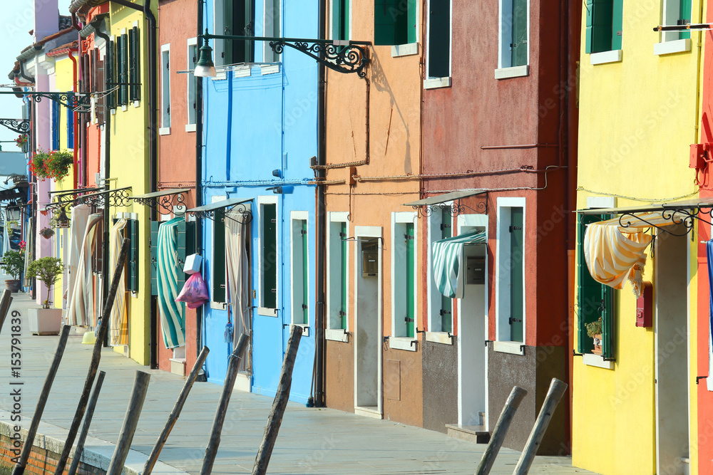 Colorful houses on the island of Burano near Venice in Italy in summer Colorful houses on the island of Burano near Venice in Italy in summer