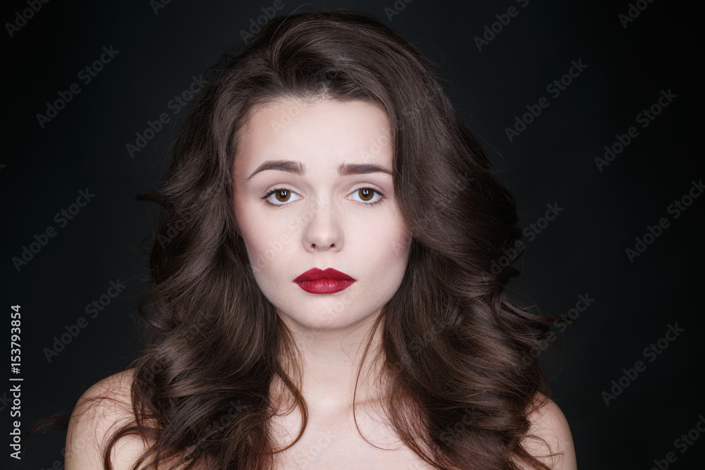 So cute. Studio portrait of an adorable young woman looking disappointed to the camera. So cute. Studio portrait of an adorable young woman looking disappointed to the camera.