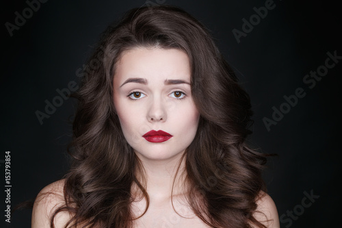 So cute. Studio portrait of an adorable young woman looking disappointed to the camera.