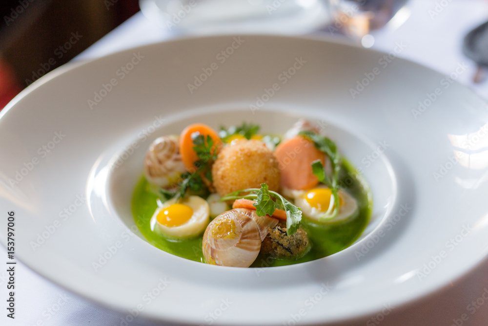 Snails with poached eggs Snails with poached eggs