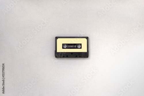 Top view of old style cassette music tape with blank label for typing text