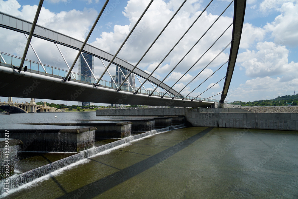 Naklejka premium Modern architecture design of a pedestrian bridge in Putrajaya, Malaysia