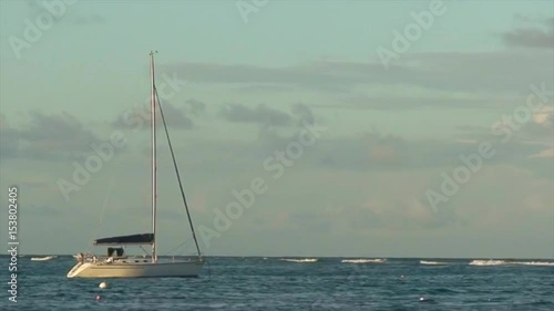 Sailboat Bobbing in a Caribbean Sea