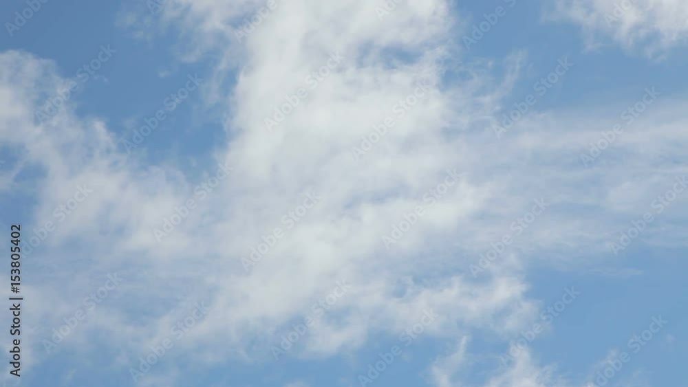 Blue sky background with white clouds moving fast. Full HD stock footage shot at summer season time.
Blue sky background with white clouds moving fast. Full HD stock footage shot at summer season time.