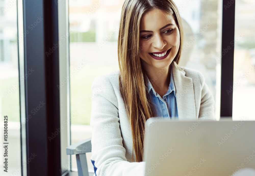 Beautiful Young Woman Working on Laptop Beautiful Young Woman Working on Laptop