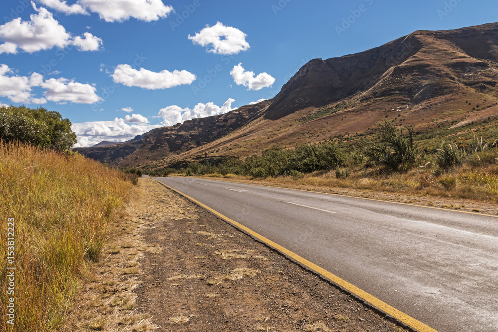  Asphalt Road Running Through Dry Orange Winter Mountain Landscape