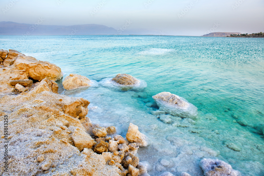View of Dead Sea coastline at sunset, Israel View of Dead Sea coastline at sunset, Israel