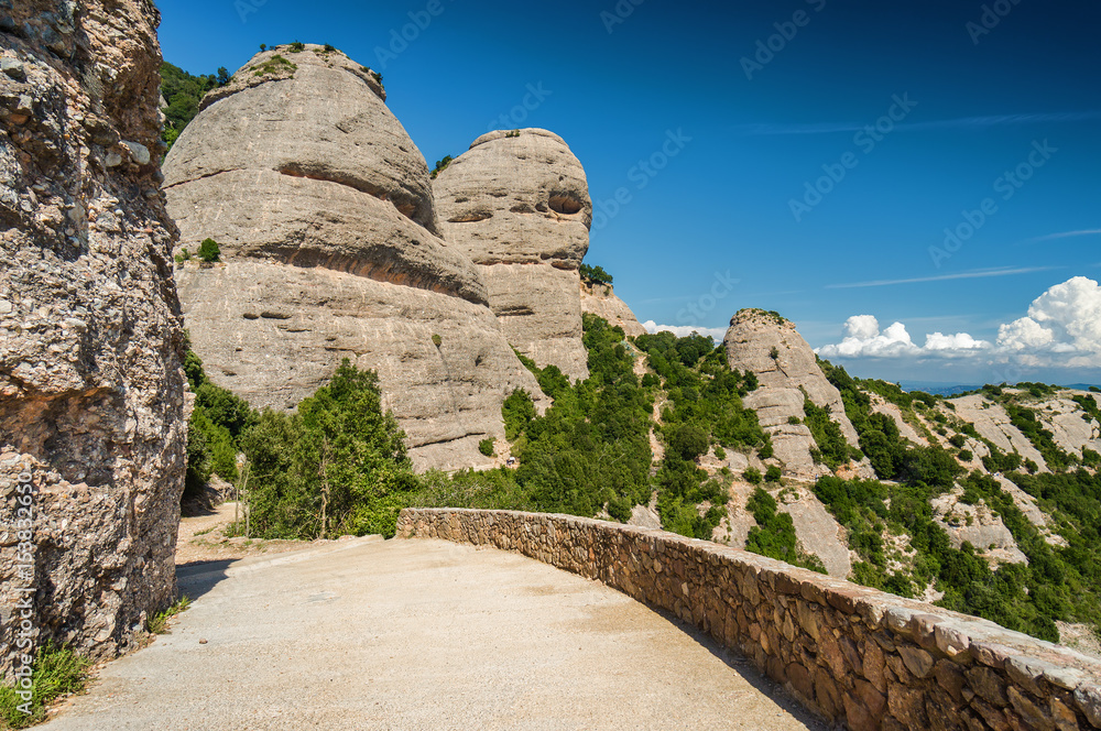 Sunny view of mountains of Santa Maria de Montserrat Abbey in Monistrol de Montserrat, Catalonia, Spain.