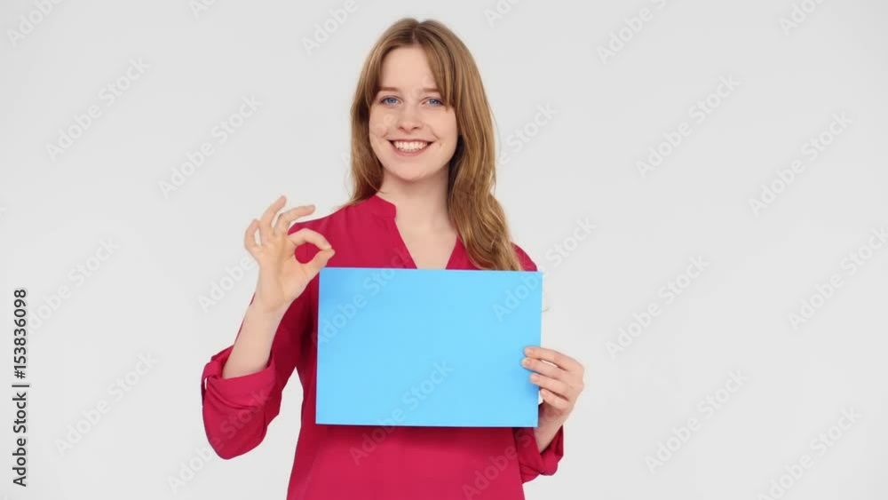 Very beautiful girl with perfect teeth is a sign for inscription on a white background Very beautiful girl with perfect teeth is a sign for inscription on a white background