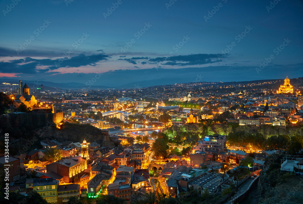  Panoramic view of Tbilisi city lights, Georgia.