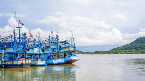 Blue fishing boat in the sea.