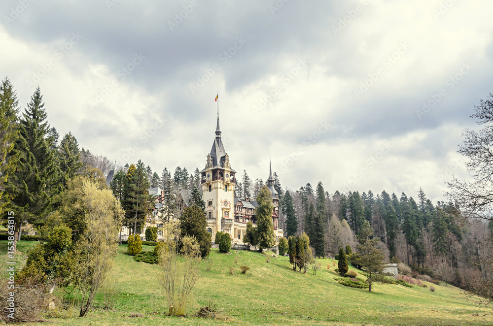 The Peles Castle from Sinaia Romania, gardens with green grass and trees