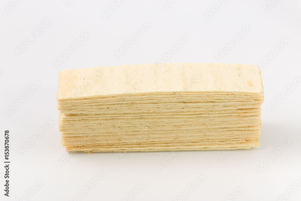 Golden chips on a white background. snack. Golden chips on a white background. snack.