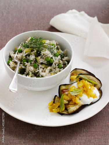 Plate of eggplant with rice and beans photo