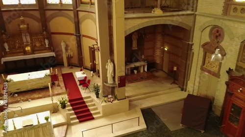 Aerial pan shot looking down to the Altar of a Catholic Church photo