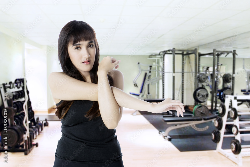 Arabian woman exercising in the gym Arabian woman exercising in the gym