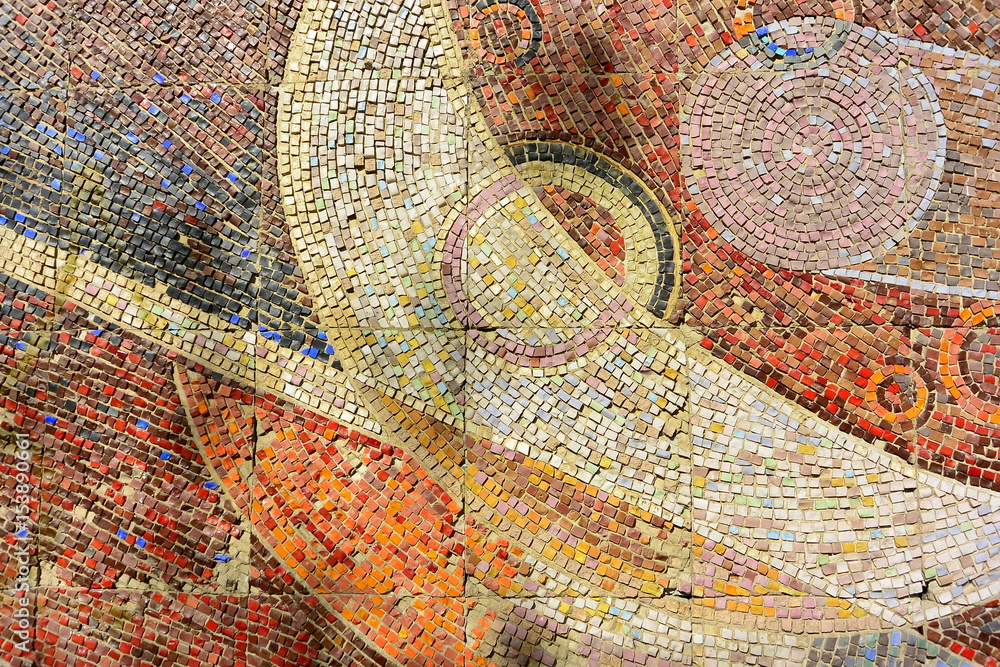 Background of ceramic Soviet mosaic. 1960s. A wall with a textured surface. Korolev, Moscow region Background of ceramic Soviet mosaic. 1960s. A wall with a textured surface. Korolev, Moscow region