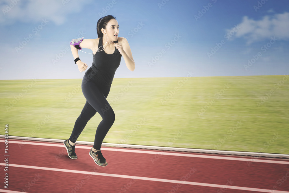 Girl running while listen music