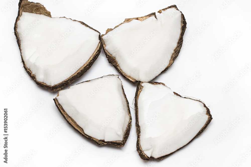 Coconut pieces isolated on a white background Coconut pieces isolated on a white background