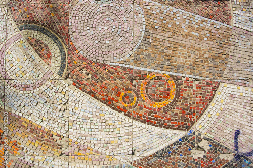 Background of ceramic Soviet mosaic. 1960s. A wall with a textured surface. Korolev, Moscow region