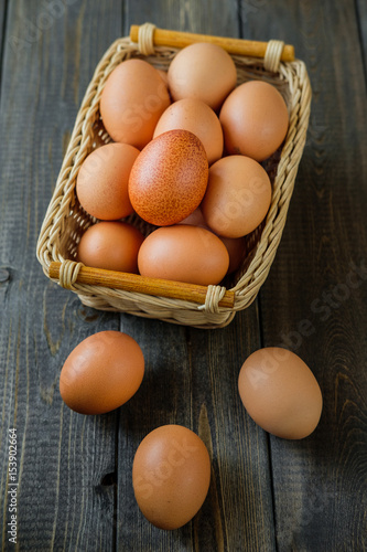 chicken eggs on wooden background