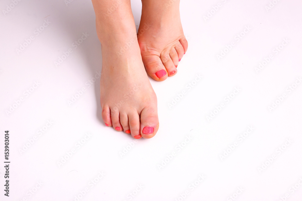 Closeup photo of a beautiful female feet with pedicure Closeup photo of a beautiful female feet with pedicure