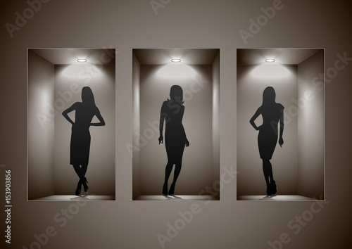 Store showcase with female silhouettes