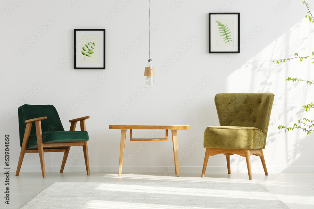 Fototapeta premium White apartment with green armchairs