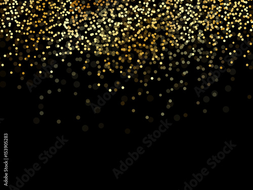 Gold confetti glitter on black background