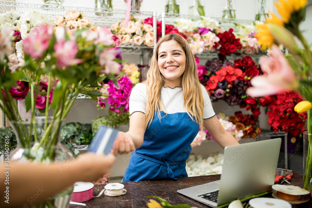 Florist taking a credit card payment