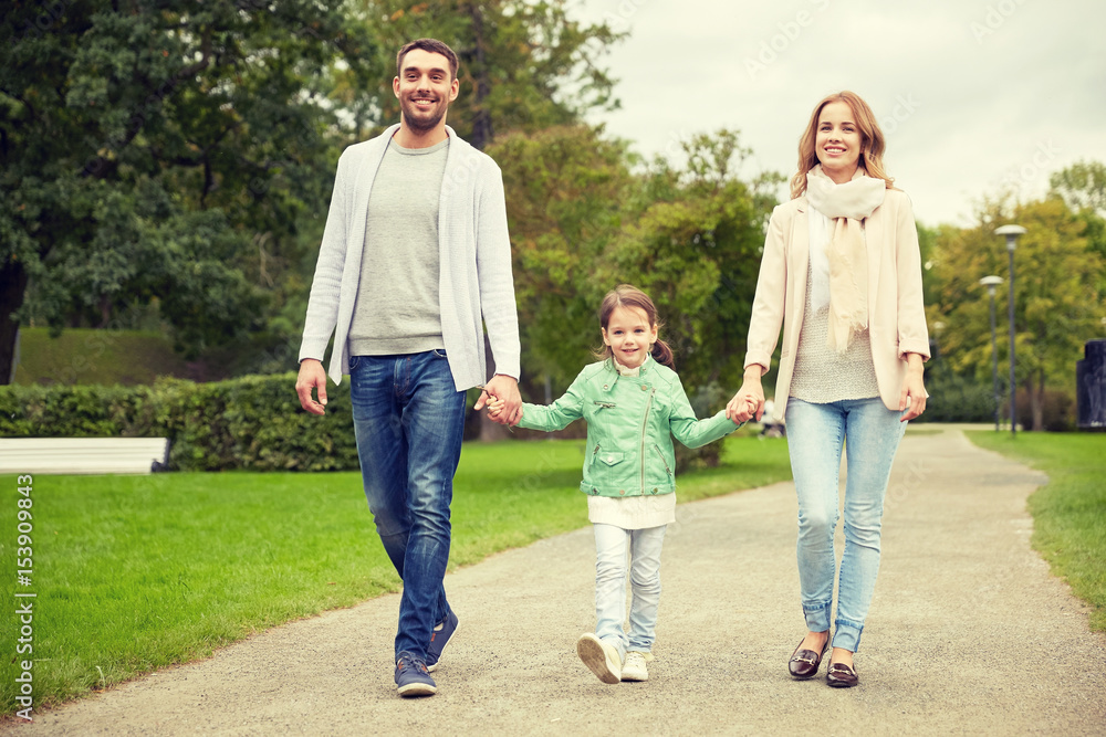 happy family walking in summer park happy family walking in summer park