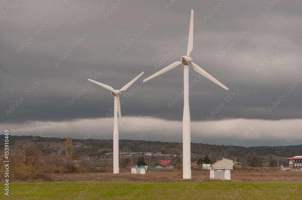 Fototapeta premium Wind turbine on a field