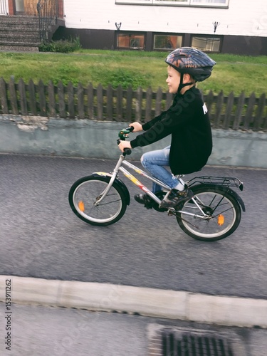 Boy on his bicycle