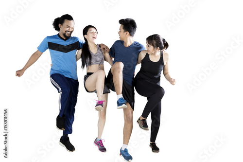 Multiracial group of friends exercising together