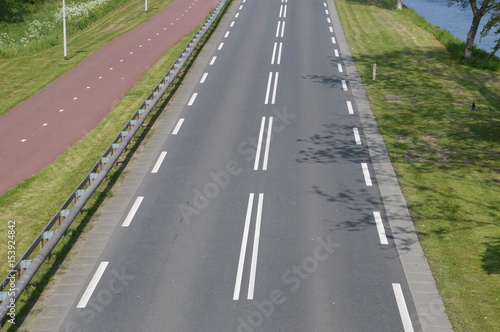 Empty Road And Bycicle Path