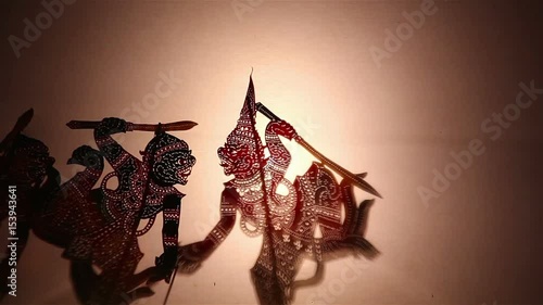Thai shadow puppet show:Shadow play which is also known as shadow puppetry is an ancient form of storytelling and entertainment which uses flat articulated figures (shadow puppets)