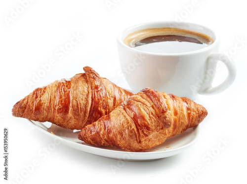 fresh croissants and coffee cup